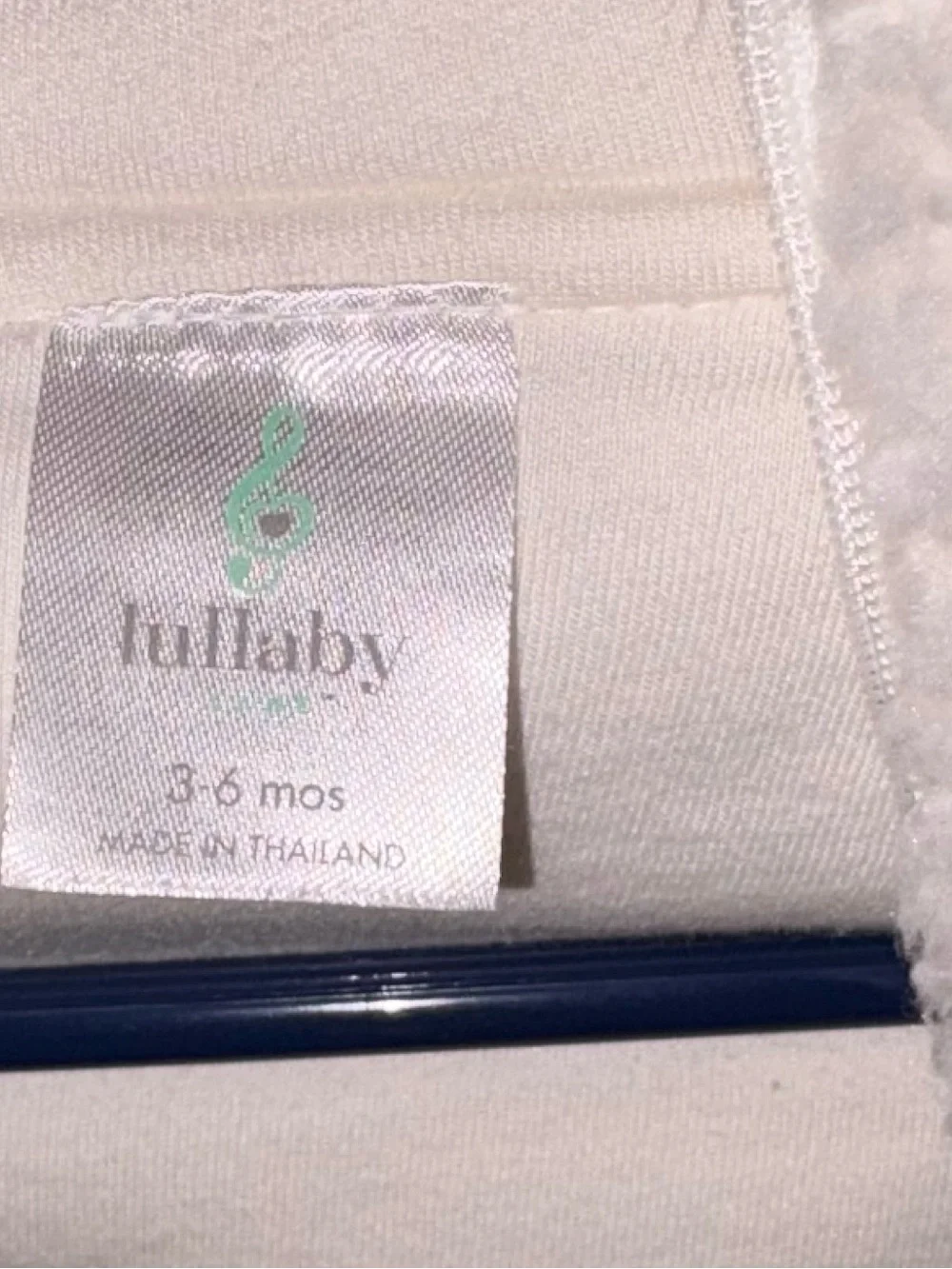 The Lullaby Club Cream Plush Footed One-Piece